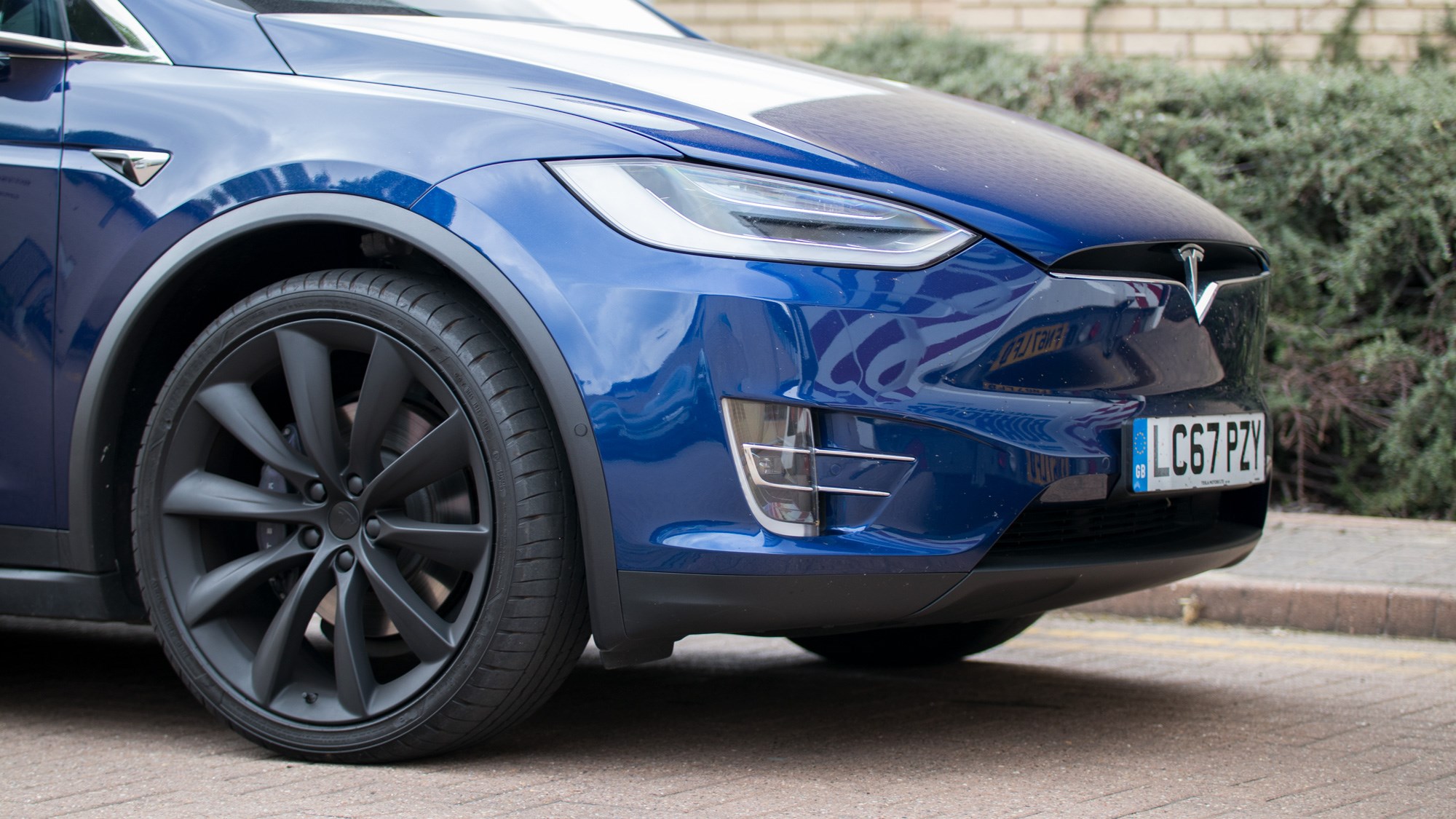 Tesla Model X - front wheel and grille-less face