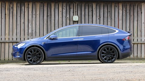 Side profile of a blue Tesla Model X