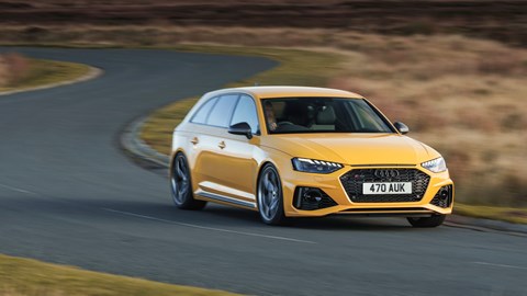 Audi RS4 Avant 25 Year Edition - yellow, front, driving round corner
