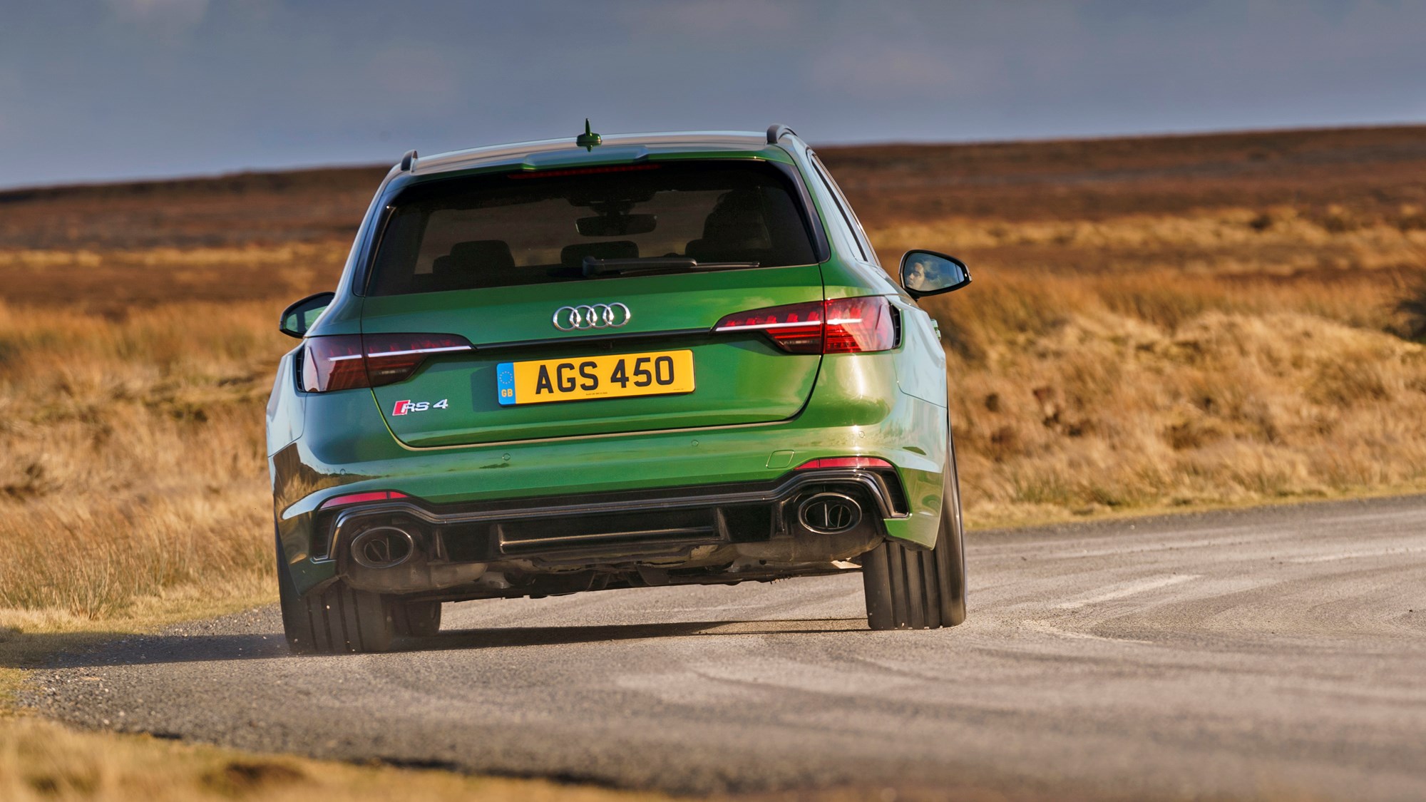 Green 2021 Audi RS4 Avant rear elevation driving