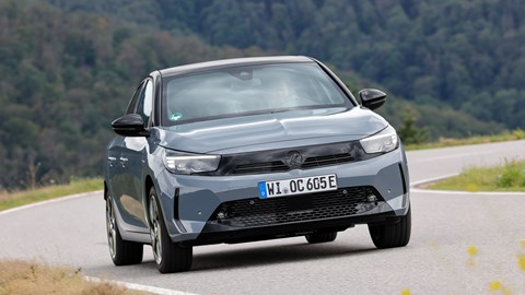 Vauxhall Corsa Electric (2023) review: front three quarter cornering, German roads, grey paint