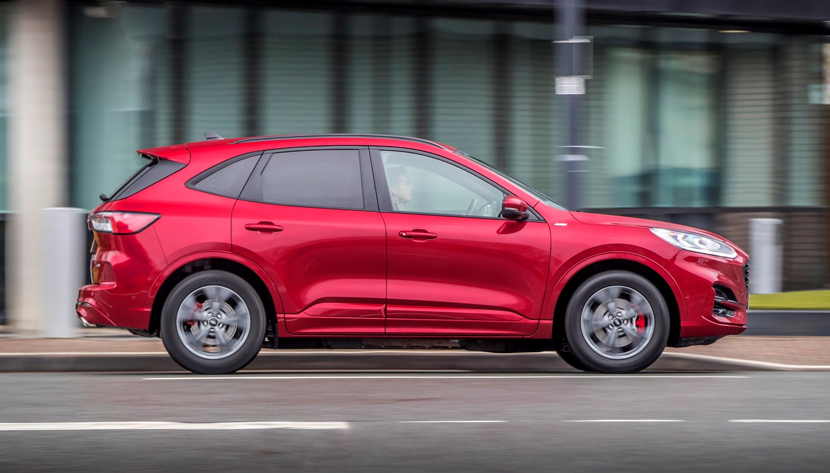 Lucid Red 2020 Ford Kuga ST-Line First Edition PHEV side elevation driving