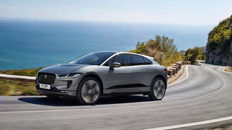 Jaguar i-Pace review - silver, front, driving on coastal road
