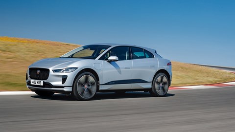 Jaguar i-Pace review - front side, silver, driving on race track
