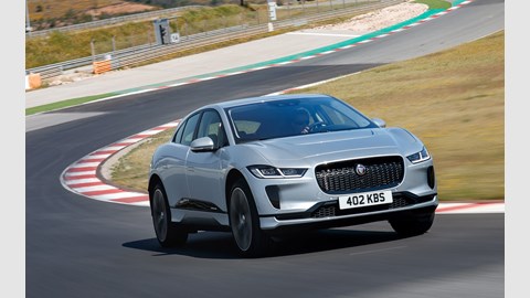 Jaguar i-Pace review - front, silver, driving on race track