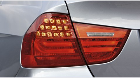 LEDs distinguish slightly different new BMW 3-series rear end. Helps disguise the Mitsubishi Carisma rear. Slightly