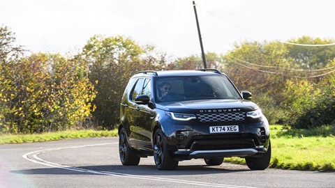Land Rover Discover (2025) review: front three quarter cornering, black paint, wide angle