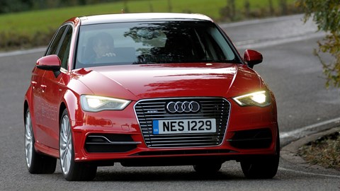Red 2014 Audi A3 Sportback e-Tron front three-quarter driving