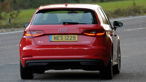 Red 2014 Audi A3 Sportback e-Tron rear three-quarter driving