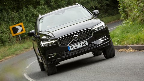 Volvo XC60 hybrid review - T8 Twin Engine plug-in driven, dead-on front view, black, driving, 2020