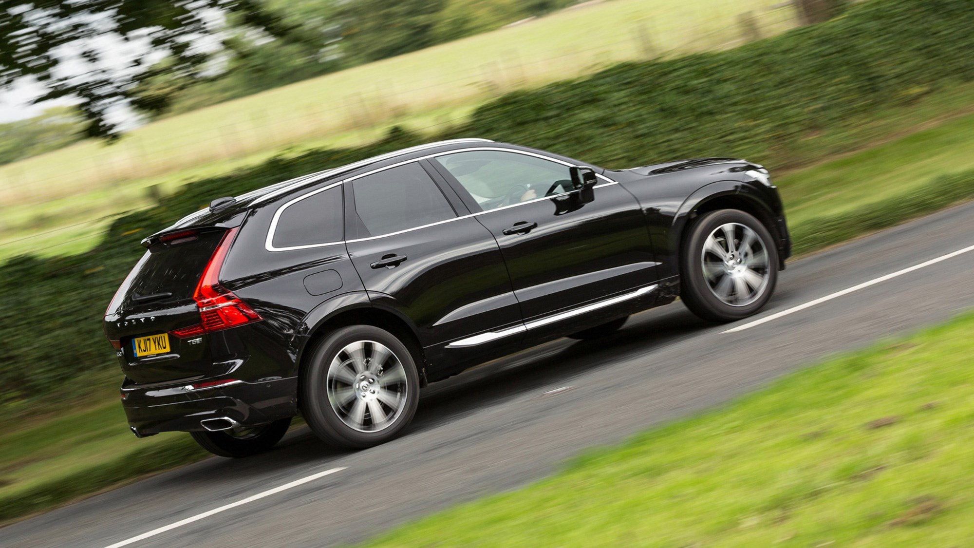 Volvo XC60 hybrid review - T8 Twin Engine plug-in driven, side view, black, driving, 2020