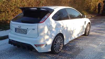 Ford Focus RS (2009) first ride: CAR's assistant editor Ben Barry hitched a lift in this white Focus RS with Jost Capito