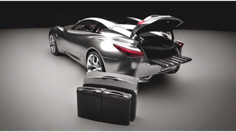 Essence concept car comes with Louis Vuitton luggage. It's monogrammed with designer Shiro Nakamura's inititals