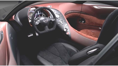 Infiniti Essence cabin photo: asymmetric design meets Japanese precision. Note the charcoal shades on driver's side, warmer tans and reds in the passenger zone. Laurence Llewellyn-Bowen would approve