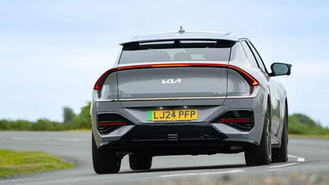 Kia EV6 facelift review: rear three quarter cornering, ow angle, grey paint