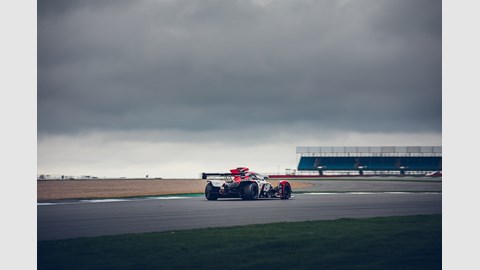Rear bodywork is a cutaway, exposing the rear tyres