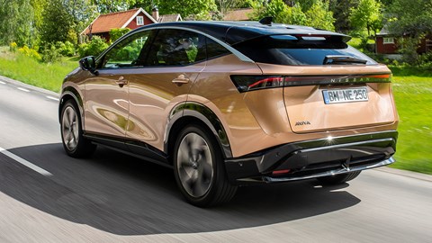Nissan Ariya electric SUV review, rear view, driving