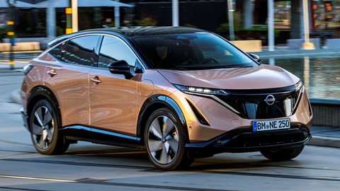 Nissan Ariya electric SUV review, front view, driving in city