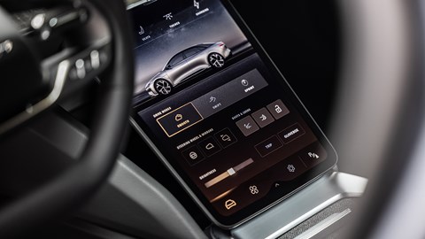 Lower touchscreen slides away at the touch of a button