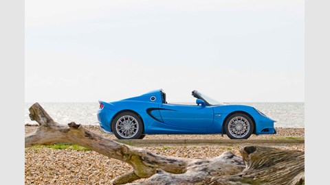 Roof off, the new Lotus Elise (2010) strikes a familiar pose