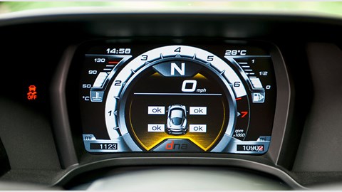 All digital instrument cluster gives the 4C a modern race car feel; dials change colour as you approach the rev limit - though noise from engine behind you also a big clue