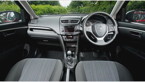 The cabin of the Suzuki Swift 2014. Feeling its age a bit now