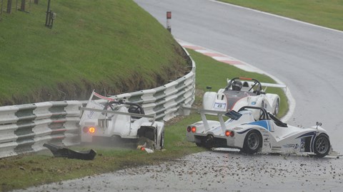 Sam Moores, Peter Brookes and Richard Baxter after the attempted restart at Cadwell Park