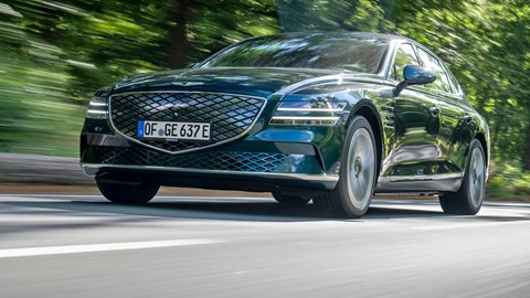 Genesis Electrified G80 review, front view, driving