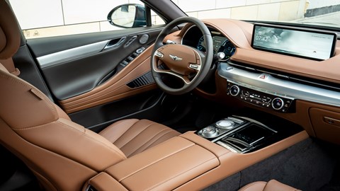 Genesis Electrified G80 review, front seats, interior, dashboard, steering wheel, infotainment