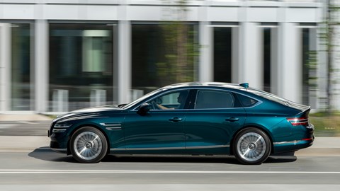 Genesis Electrified G80 review, side view, driving