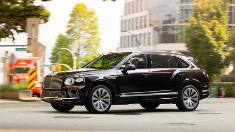 Bentley Bentayga EWB review - front view, Damson purple, driving through Vancouver