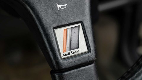 Simple Audi Sport badge on unadorned Quattro steering wheel