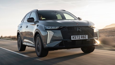 DS 7 (2023) review: front three quarter tracking shot, grey car