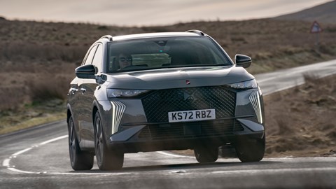 DS 7 (2023) review: front cornering shot, grey car, arid background