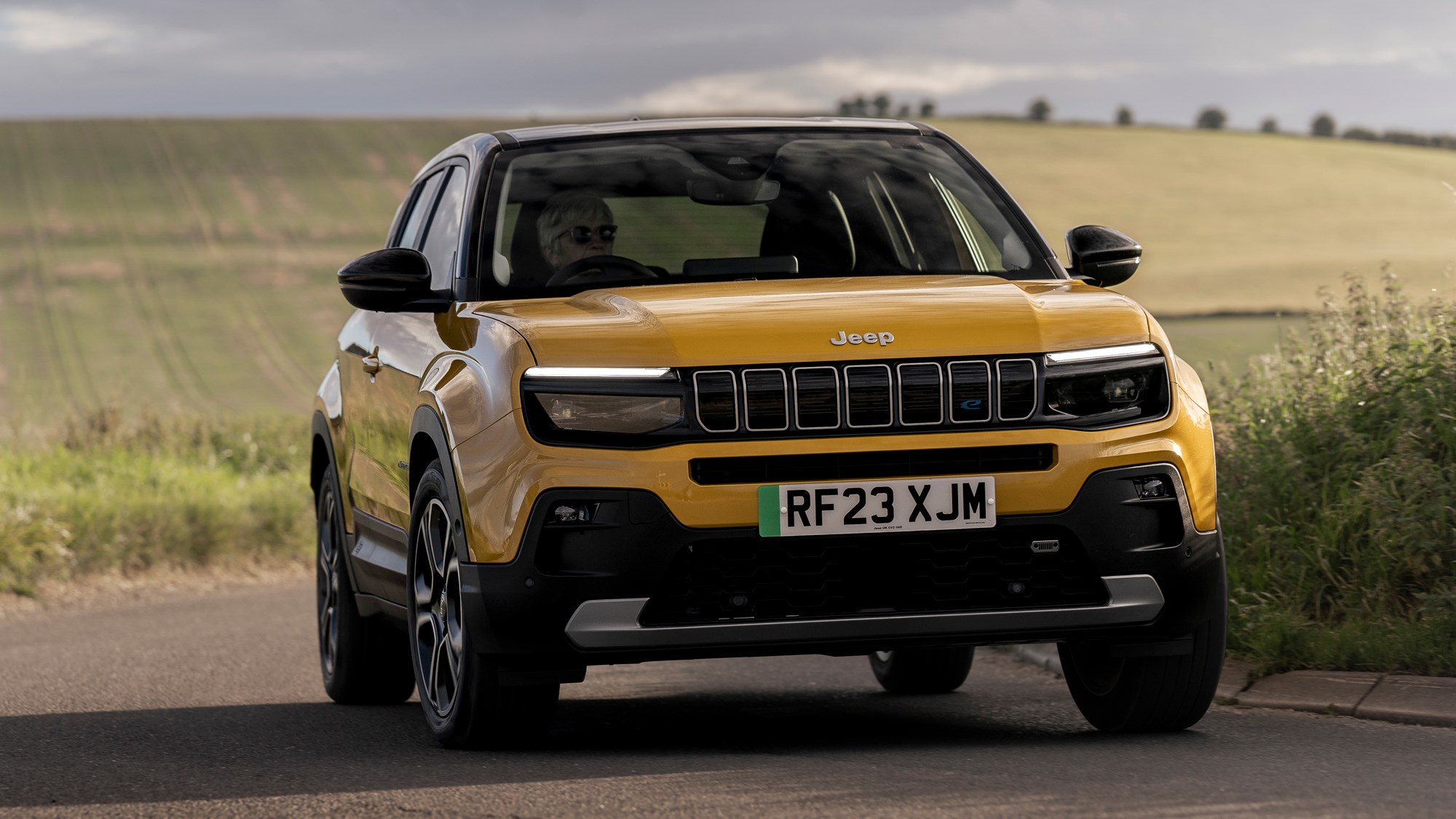 Jeep Avenger (2023) review: front three quarter cornering, yellow paint, country road
