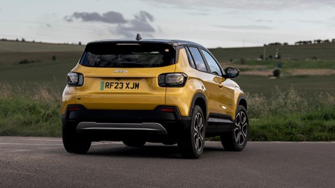 Jeep Avenger (2023) review: rear three quarter cornering, yellow paint, country road