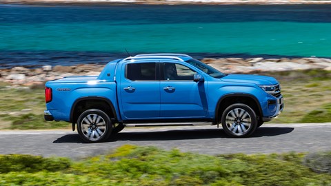 VW Amarok review, side view, blue, driving