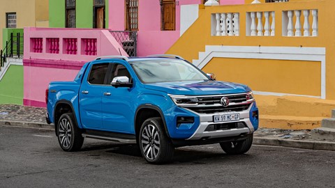 VW Amarok review, front , colourful houses ion background