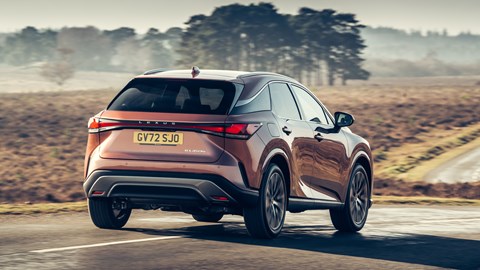 Lexus RX 450h+ review: rear three quarter cornering shot, bronze car