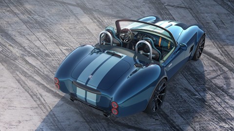 AC Cobra GT Roadster (2023): rear three quarter static, blue car, CAD render at a racetrack