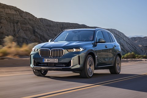 BMW X5 50e driving on a straight road