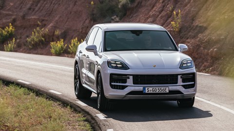 Porsche Cayenne E-Hybrid review - 2023-facelift - Turbo E-Hybrid, white, front, driving