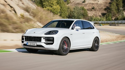 Porsche Cayenne E-Hybrid review - 2023-facelift - Turbo E-Hybrid, white, front, driving on racing circuit