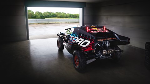 Image of Ford Raptor T1+ Dakar Rally car, static, viewed from rear