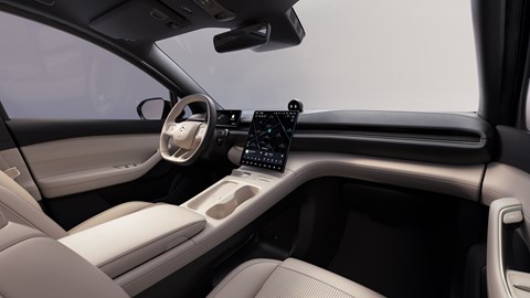 Nio EL6 dashboard and infotainment system, cream upholstery, studio background