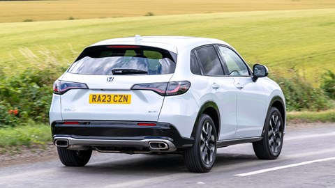 Honda ZR-V (2023) review: rear three quarter cornering, low angle, country lane, white