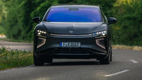 HiPhi X electric SUV review - front, driving round corner