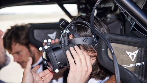 Cupra Exponential Experience: Luke Wilkinson strapped into the car, wearing VR goggles