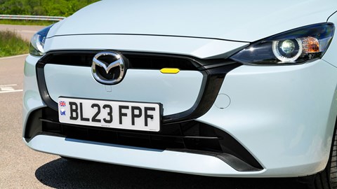 Body-coloured panel in grille of 2023 Mazda 2