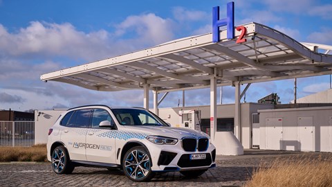 What is a hydrogen car? BMW hydrogen-powered SUV parked at a H2 refuelling station
